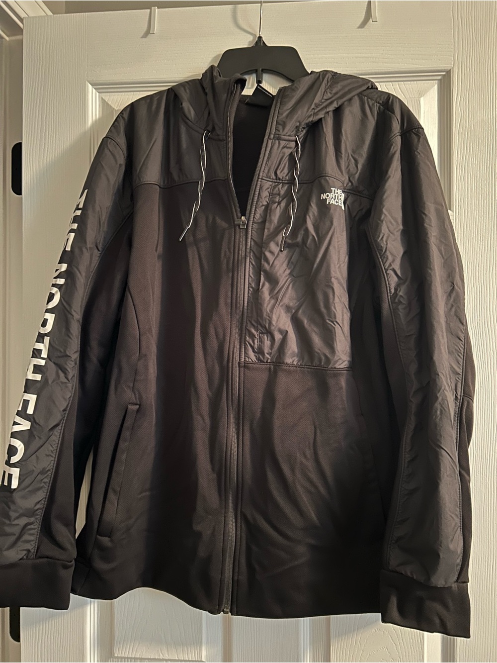 The North Face Men's Black Hooded Lightweight Jacket with Sleeve Logo